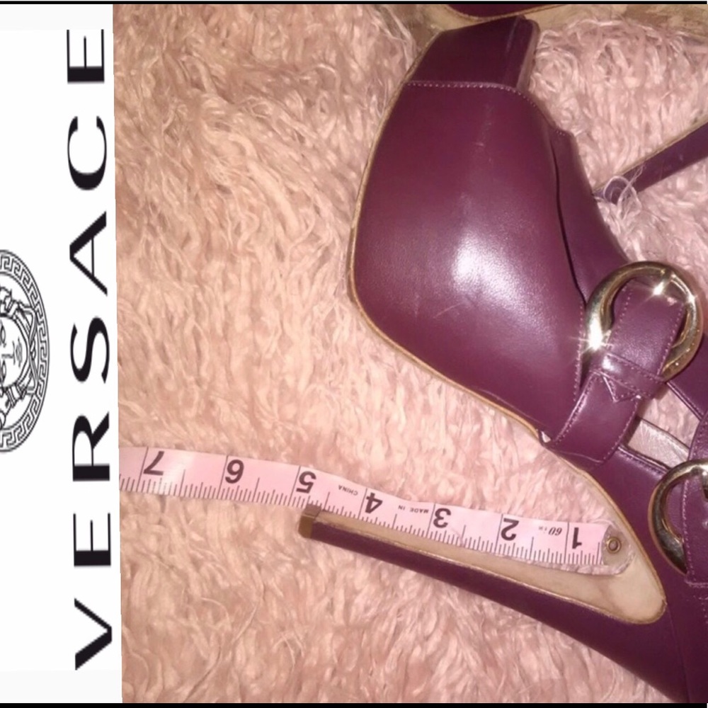 Versace  open to (Trade)